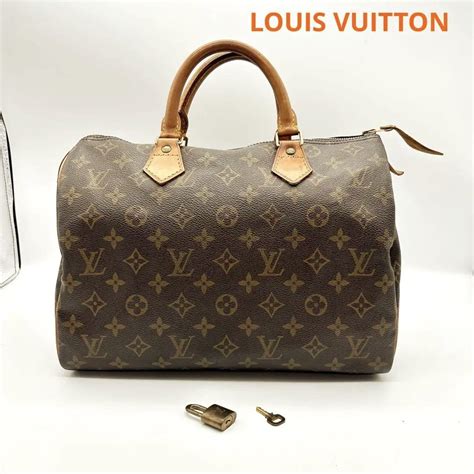 lv ハンドバッグ モノグラム デカ錠